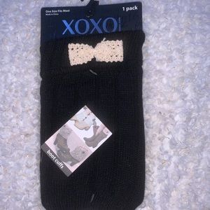 brand new black boot warmers with tan bow on front